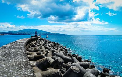 Scenic view of sea against blue sky