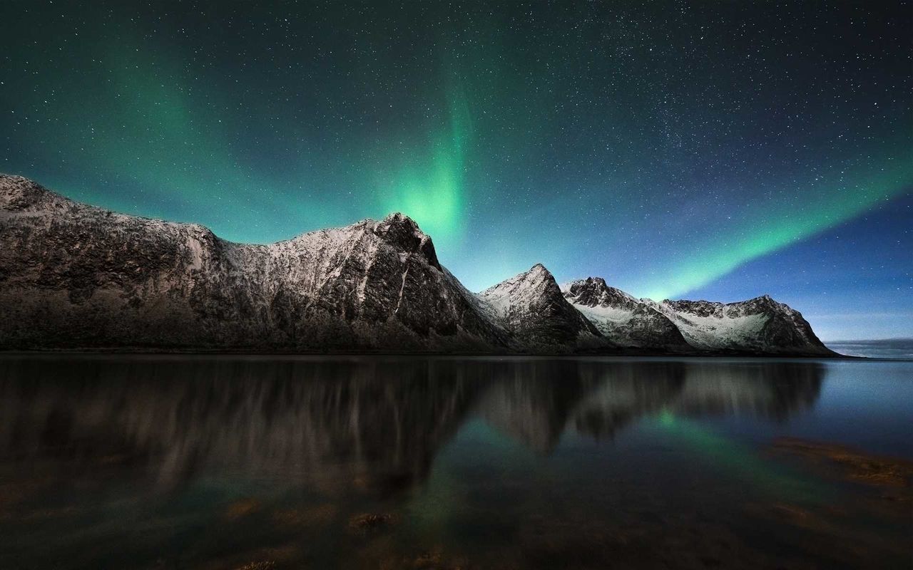 water, tranquility, beauty in nature, scenics - nature, night, sky, tranquil scene, reflection, mountain, lake, idyllic, astronomy, no people, nature, star - space, green color, waterfront, space, non-urban scene, aurora polaris, snowcapped mountain