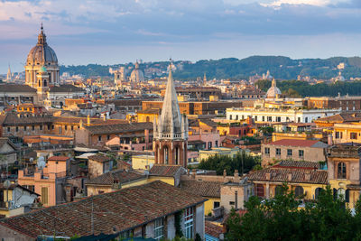 Buildings in city against sky