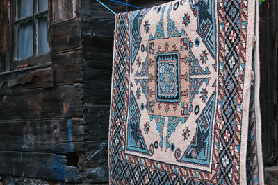 View of carpet drying on clothesline