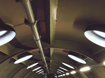 Low angle view of illuminated lights in building