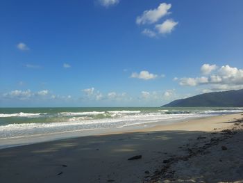 Scenic view of beach against sky