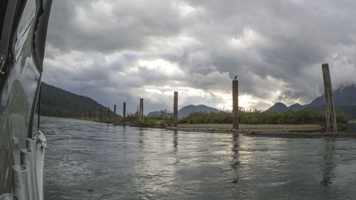 Panoramic view of lake against cloudy sky