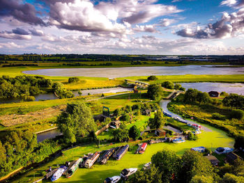 High angle view of grassy field against sky