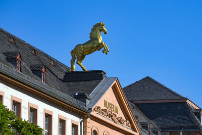 Low angle view of statue against clear sky