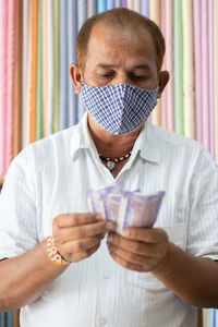 Portrait of man wearing mask