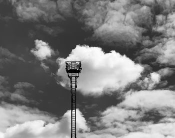 Low angle view of floodlight against sky