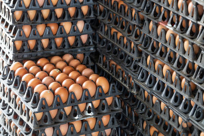Full frame shot of eggs on cartons