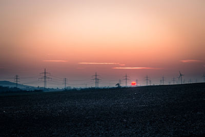 Scenic view of road against sky at dusk