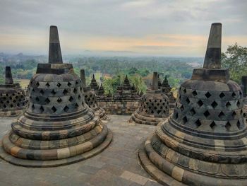 Ancient temple against building