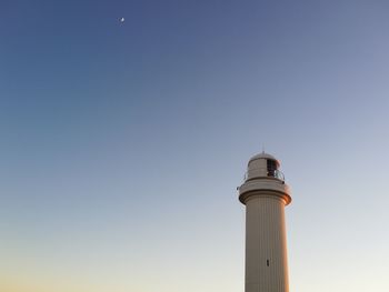 Low angle view of lighthouse against clear sky