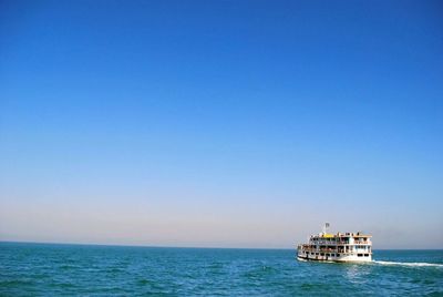 Boat sailing in sea