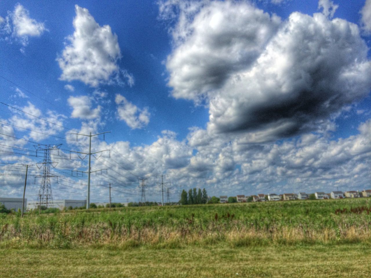 field, sky, landscape, grass, cloud - sky, electricity pylon, rural scene, tranquil scene, tranquility, fuel and power generation, agriculture, power line, nature, cloud, farm, cloudy, scenics, electricity, beauty in nature, growth