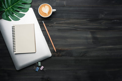 High angle view of coffee cup on table