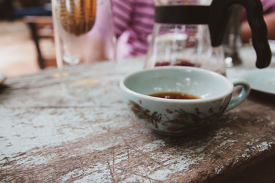 Close-up of tea cup on table