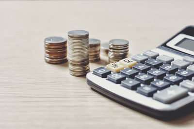 Close-up of coins on table