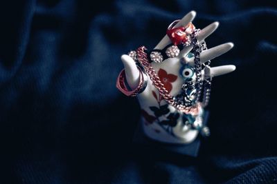 Close-up high angle view of human hand on table