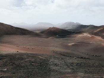 Scenic view of desert against sky