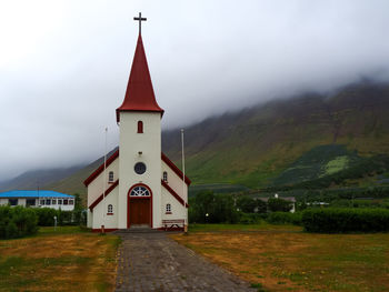 Icelandic church and low mist in the westfjords of iceland