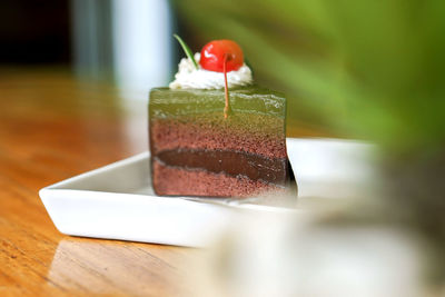 Close-up of cake served on table