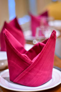 Close-up of pink flower on table