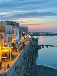 High angle view of city at sunset