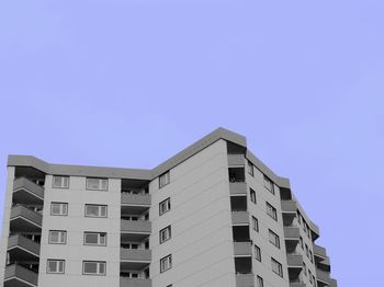 Low angle view of residential buildings against clear sky