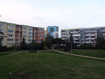 Buildings in city against sky