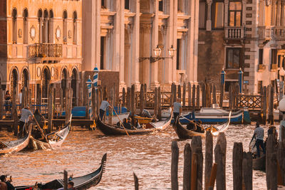 Boats moored at harbor