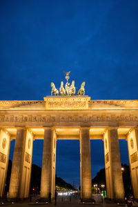 Statue of historical building at night