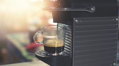 Close-up of coffee cup on table