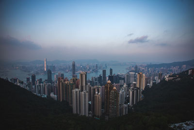 Panoramic view of buildings in city against sky