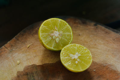 Close-up of lemon slice on cutting board