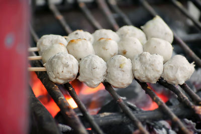 Close-up of meat on barbecue grill