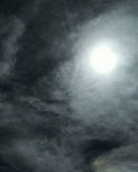 Low angle view of airplane flying in sky