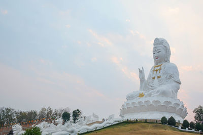 Beautiful white statues of the ancient guanyin are large