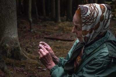 Close-up of woman in forest