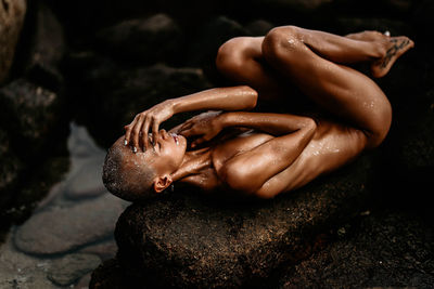 Young bald girl on the beach