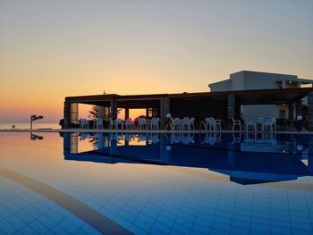 Silhouette of building at sunset