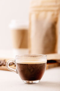 Close-up of coffee cup on table