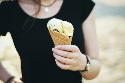 Woman holding ice cream cone