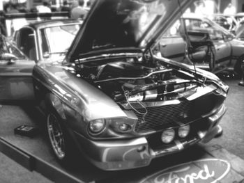 Close-up of car on road