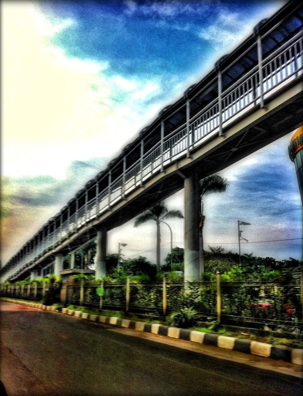 bridge - man made structure, architecture, connection, built structure, sky, water, cloud - sky, bridge, river, railing, engineering, cloud, cloudy, transportation, no people, outdoors, building exterior, day, reflection, low angle view