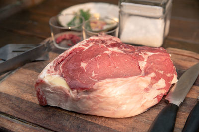 Italian steak ready to be cooked on a barbeque. appetizing piece of meat ready to be set on bbq fire