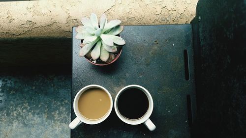 High angle view of coffee in cup on table