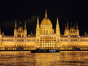 Low angle view of historic building at night