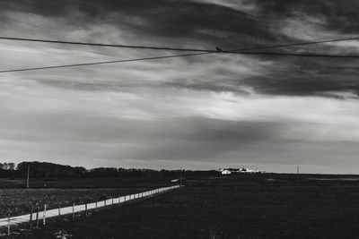 View of road against cloudy sky