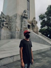 Full length of boy standing outdoors