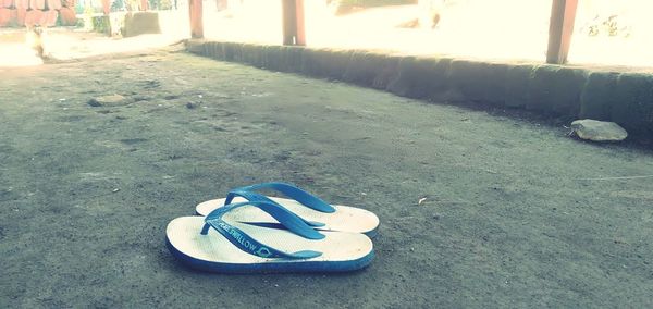 High angle view of shoes on street