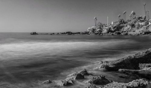 Scenic view of sea against clear sky